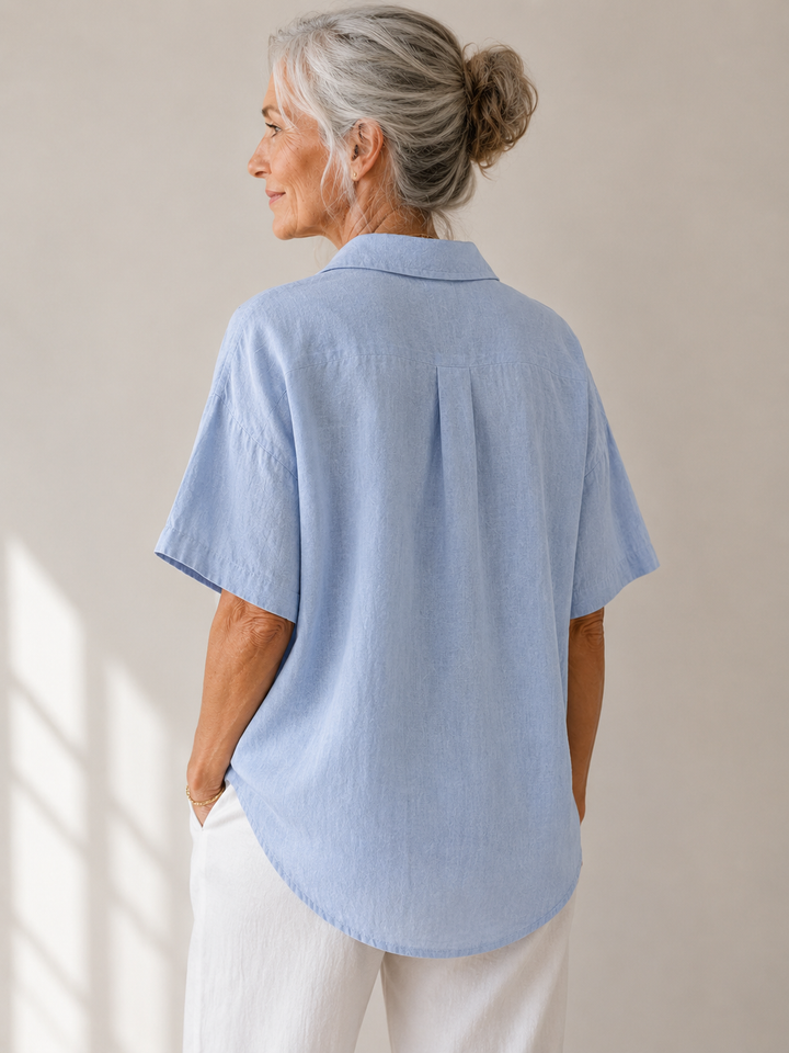 Blouse avec col et détail de bouton